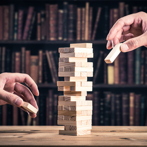 two people playing jenga 