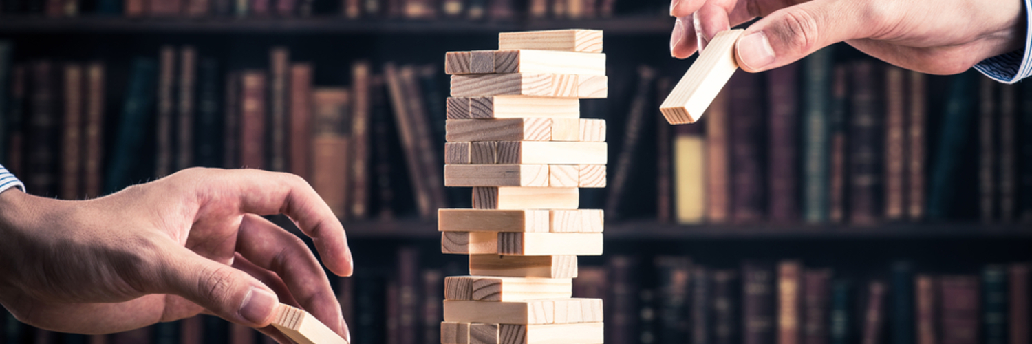 two people playing jenga 