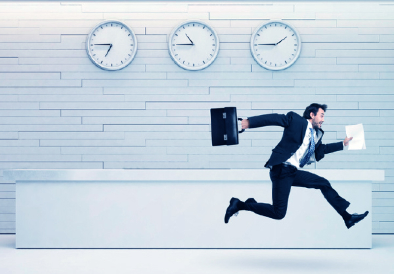 man running with briefcase